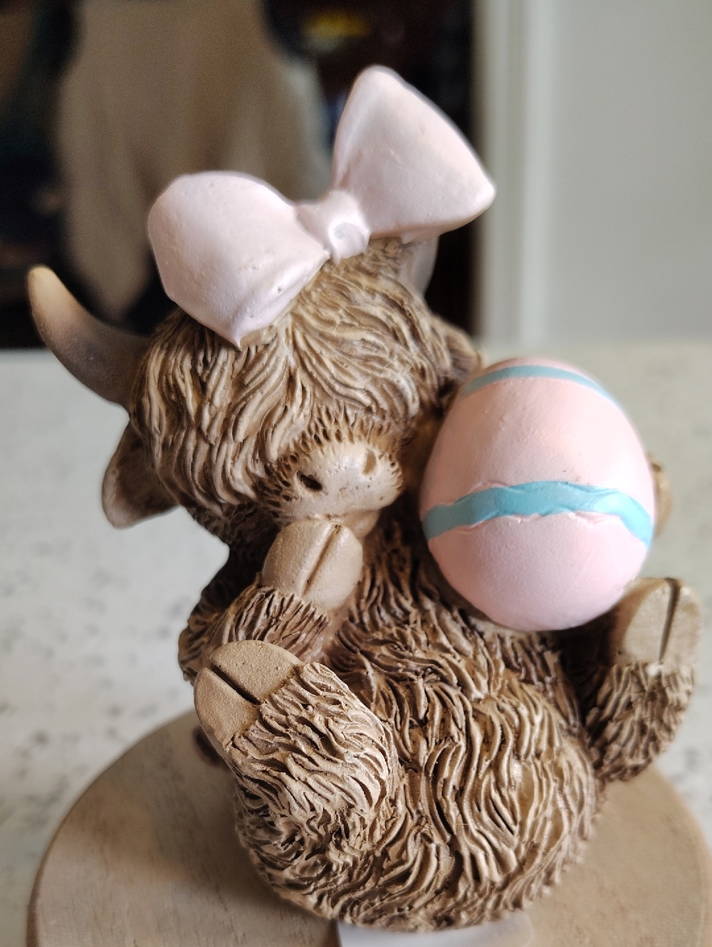 Highland Cow Figurine with Pink Bow and Pastel Egg